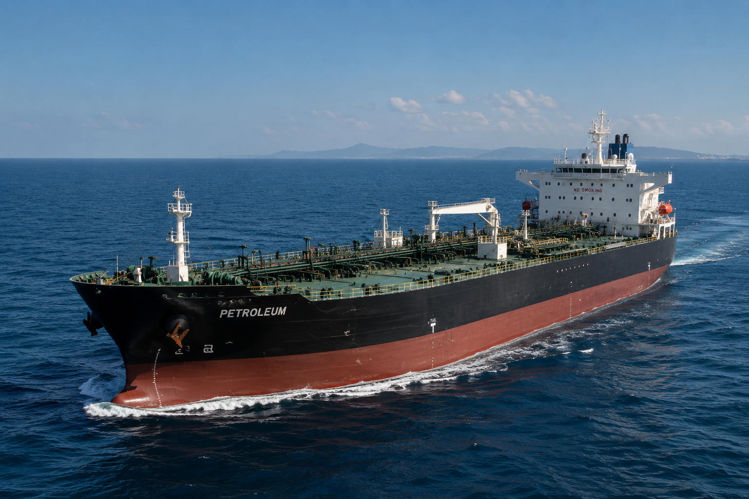 Oil tanker docked at fuel loading terminal port